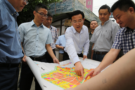 �ɶ��������ί����������в�Ǩ����